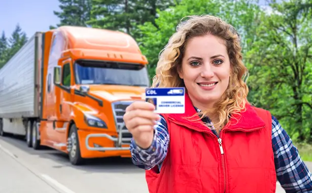 Woman professional driver holding CDL.